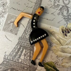Very cool old vintage Bakelite and rhinestone brooch dancing lady
